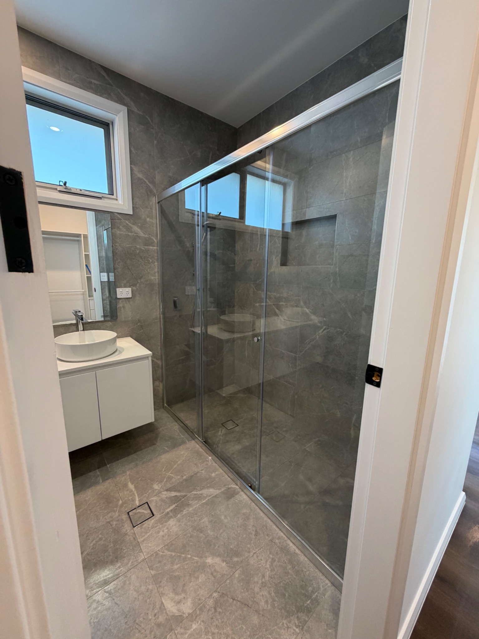 Spotless shower after professional cleaning