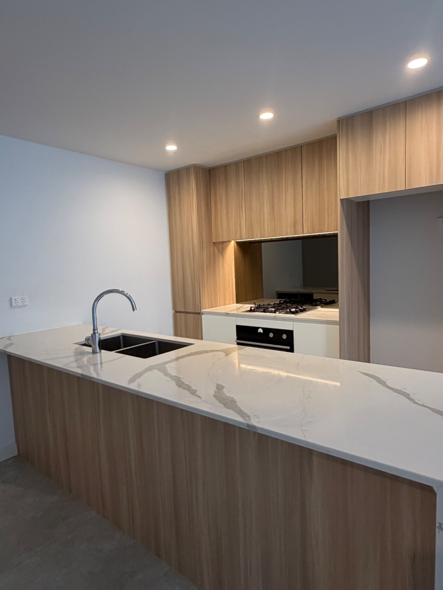 Modern kitchen professionally presented after cleaning